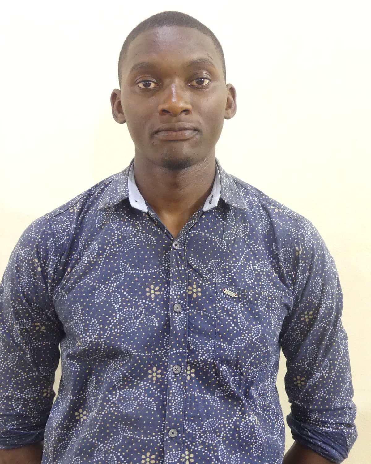 Ntege Israel Charles, portrait